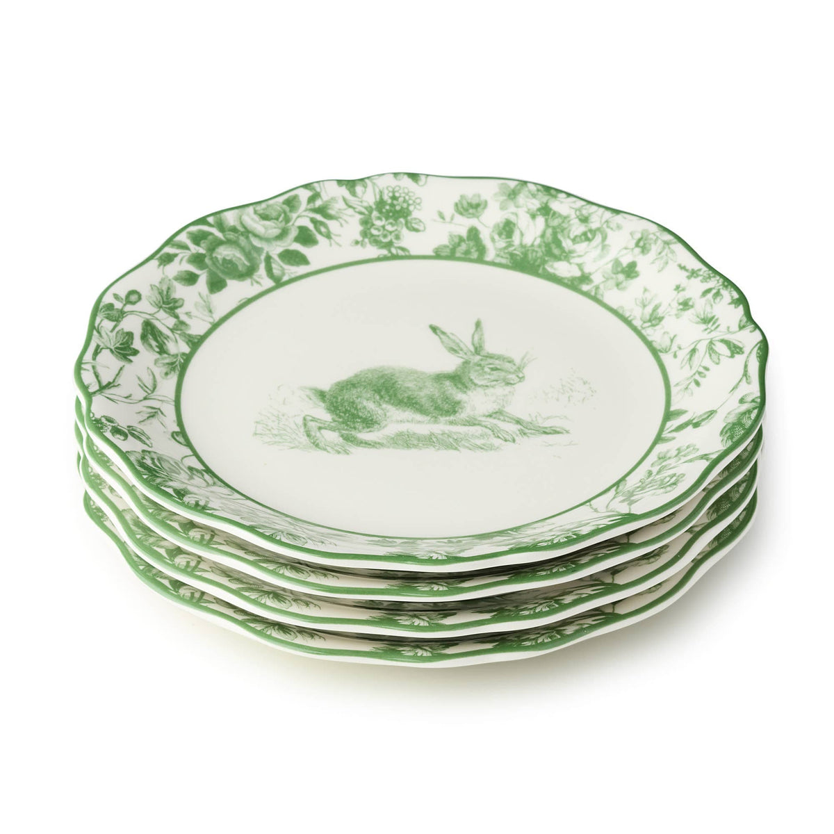 Green-and-white Easter rabbit dinner plates, four stacked with scalloped green rims