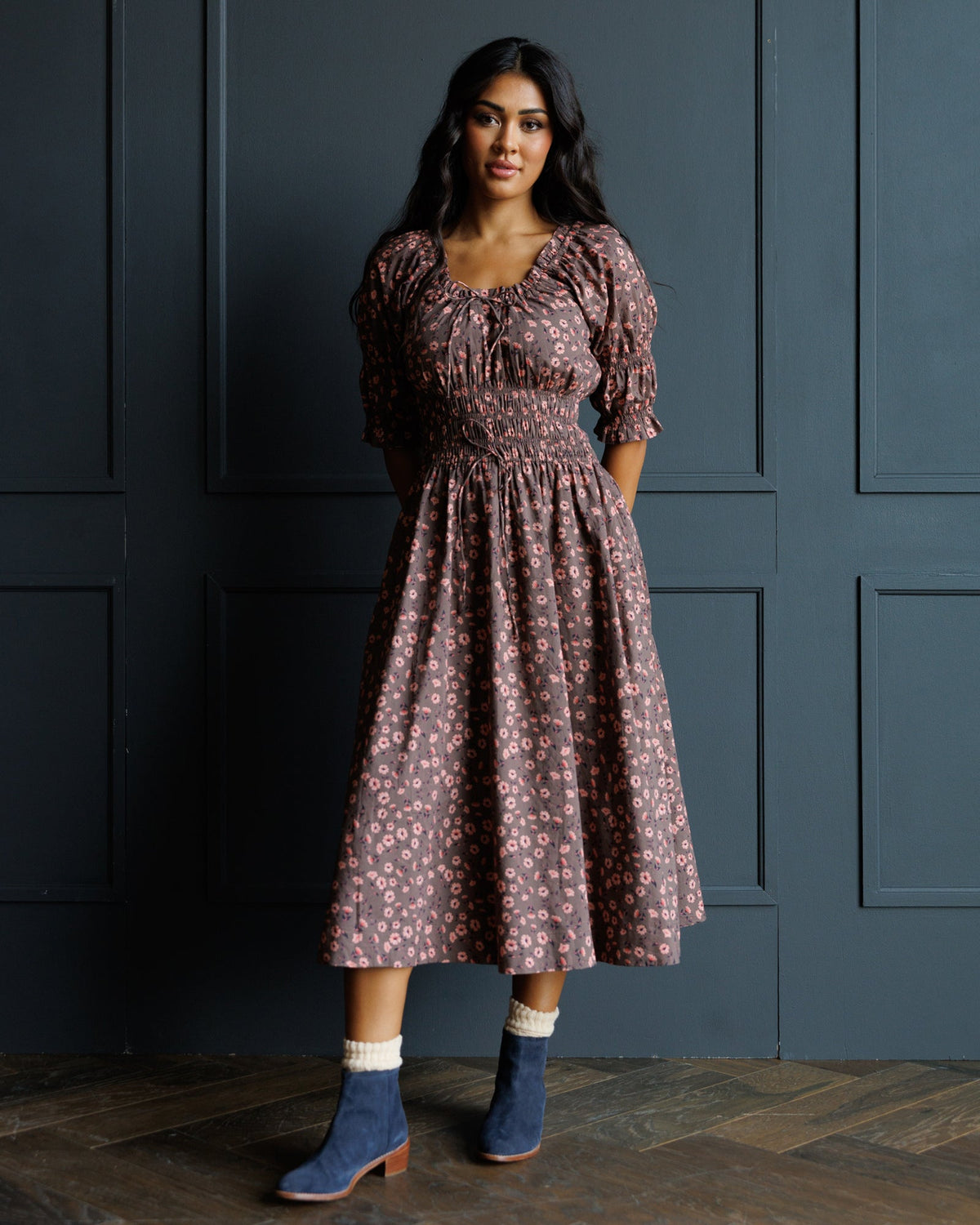 Dark rose floral midi dress with round neck, ruched bodice, and puff sleeves