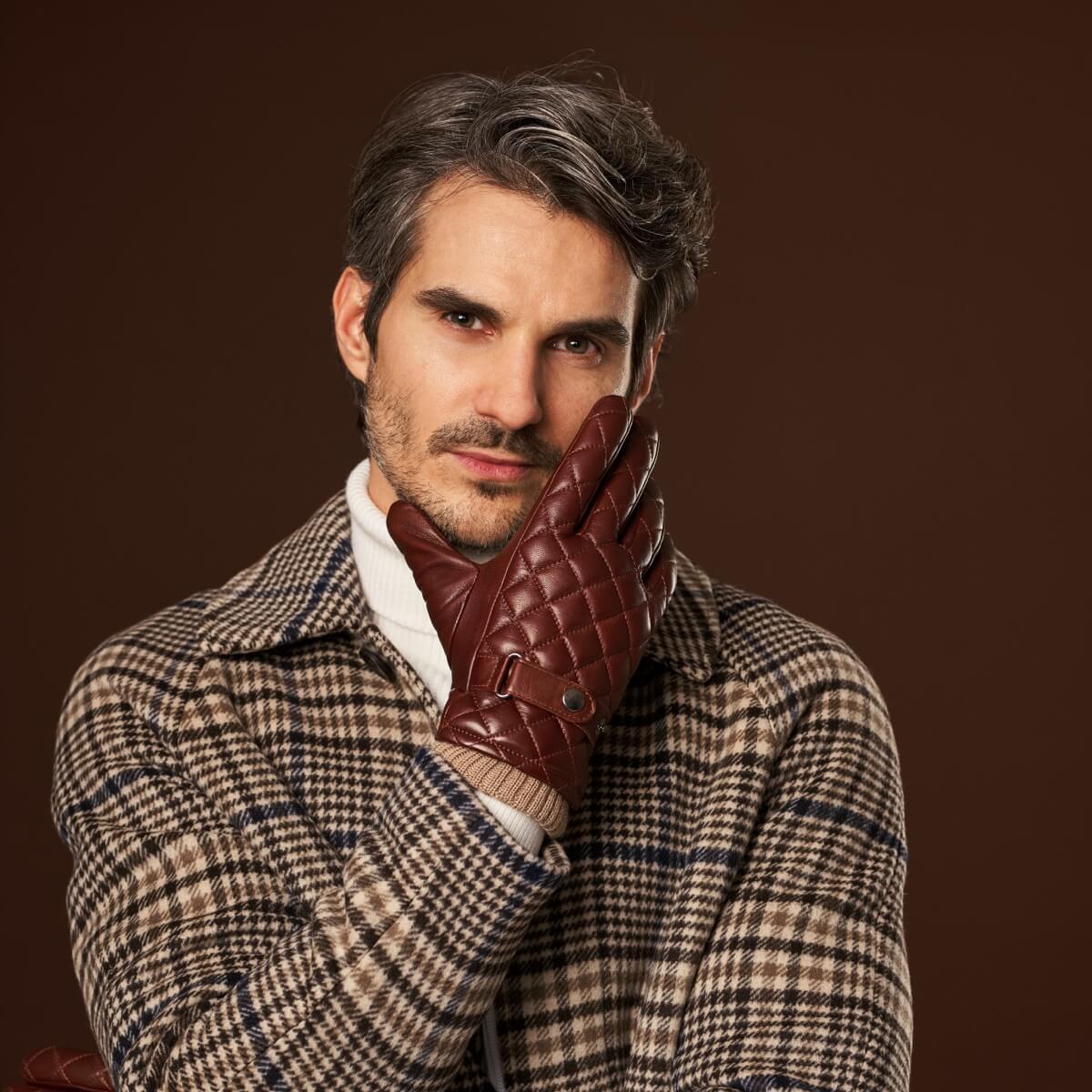 Brown quilted leather gloves with snap strap, diamond pattern, and knit lining
