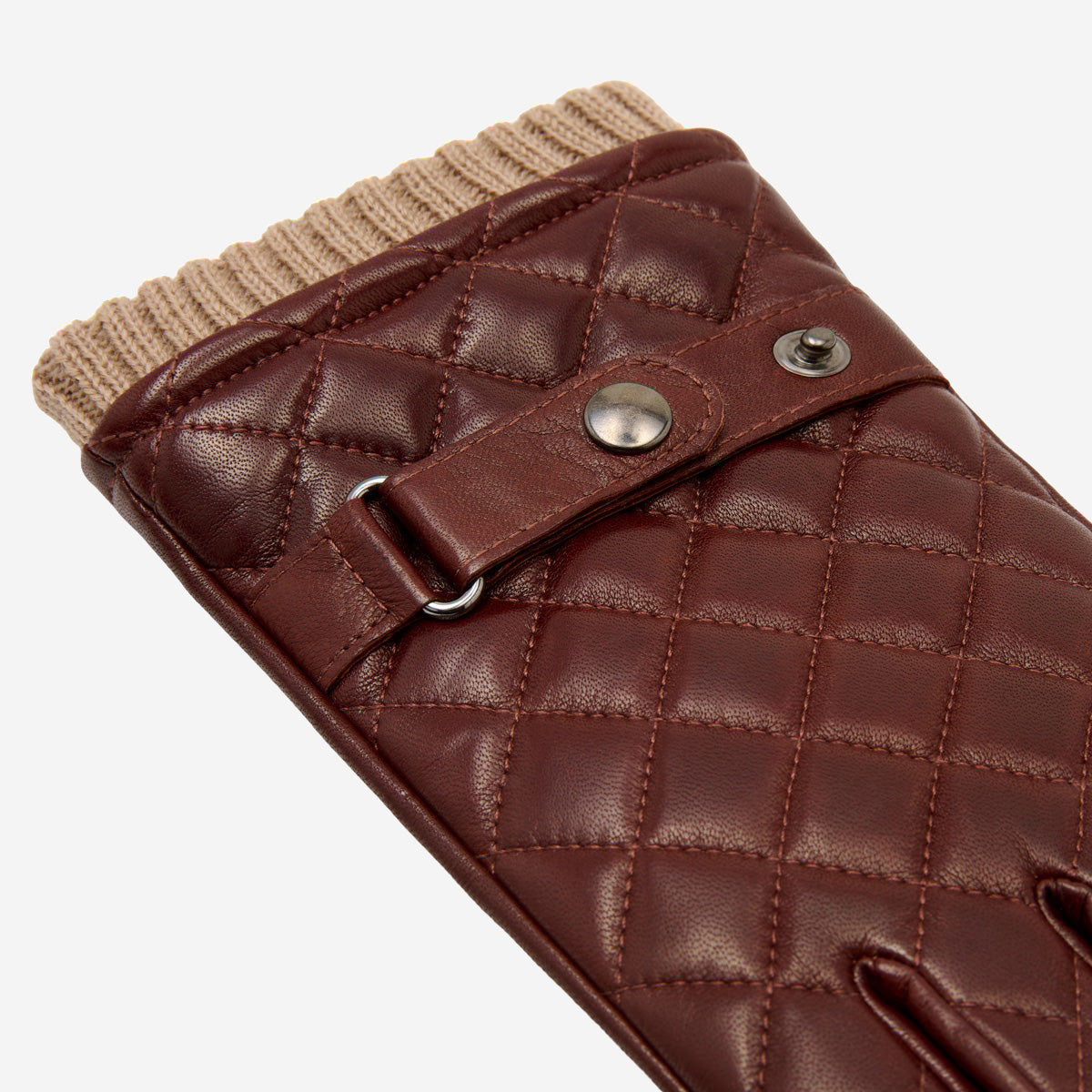 Brown quilted leather glove with snap wrist strap and ribbed knit cuff