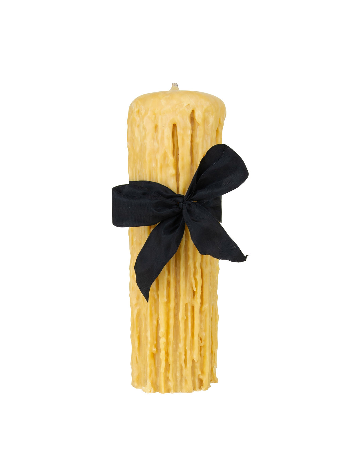 Beeswax drip pillar candle, golden color, tied with black ribbon bow