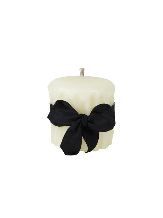 Ivory beeswax drip pillar candle with black fabric bow