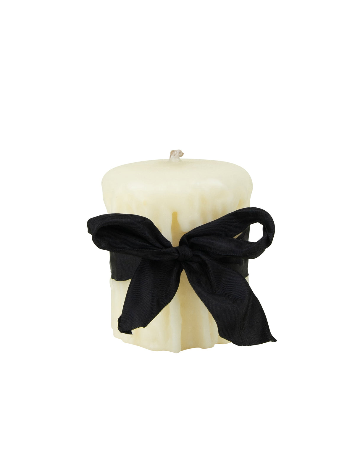 Beeswax drip pillar candle, ivory color, wrapped with a black ribbon bow