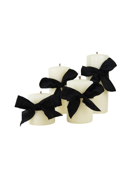 Ivory pillar candle set with black bow ribbon, smooth wax finish