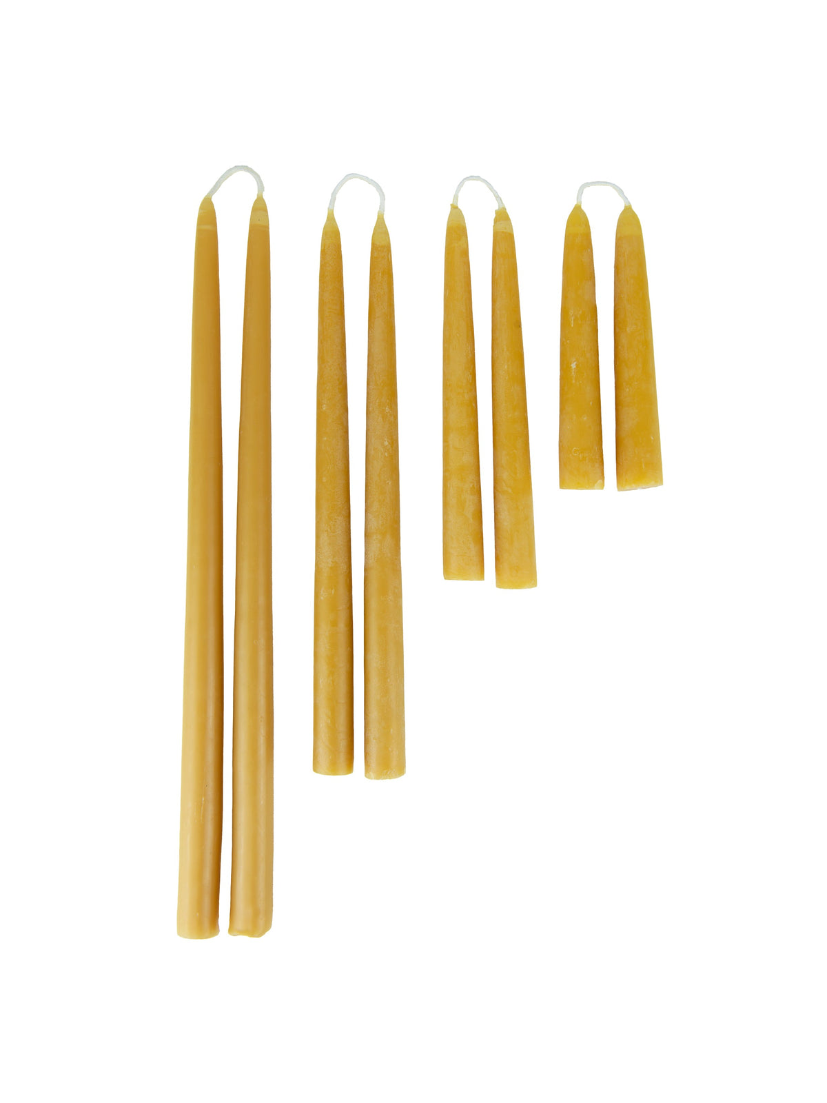 Set of six gold beeswax taper candles with white wicks