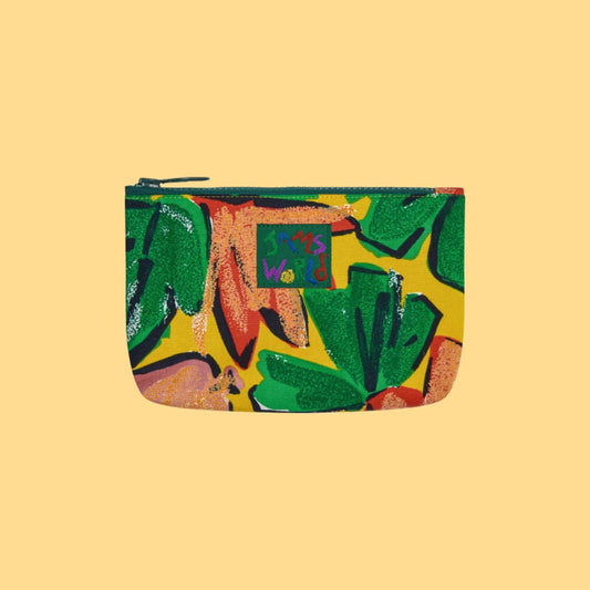 Lined zip pouch with yellow floral leaf pattern, rounded body and top zipper