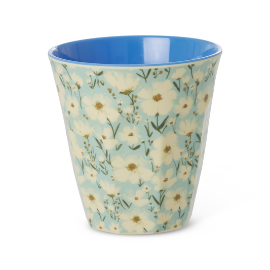 Melamine medium cup with blue interior and pale yellow floral print