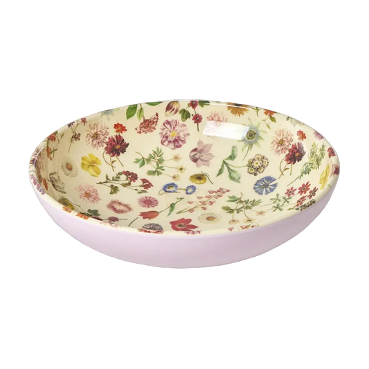 Low melamine salad bowl with oval shape, white base, and colorful floral dream print