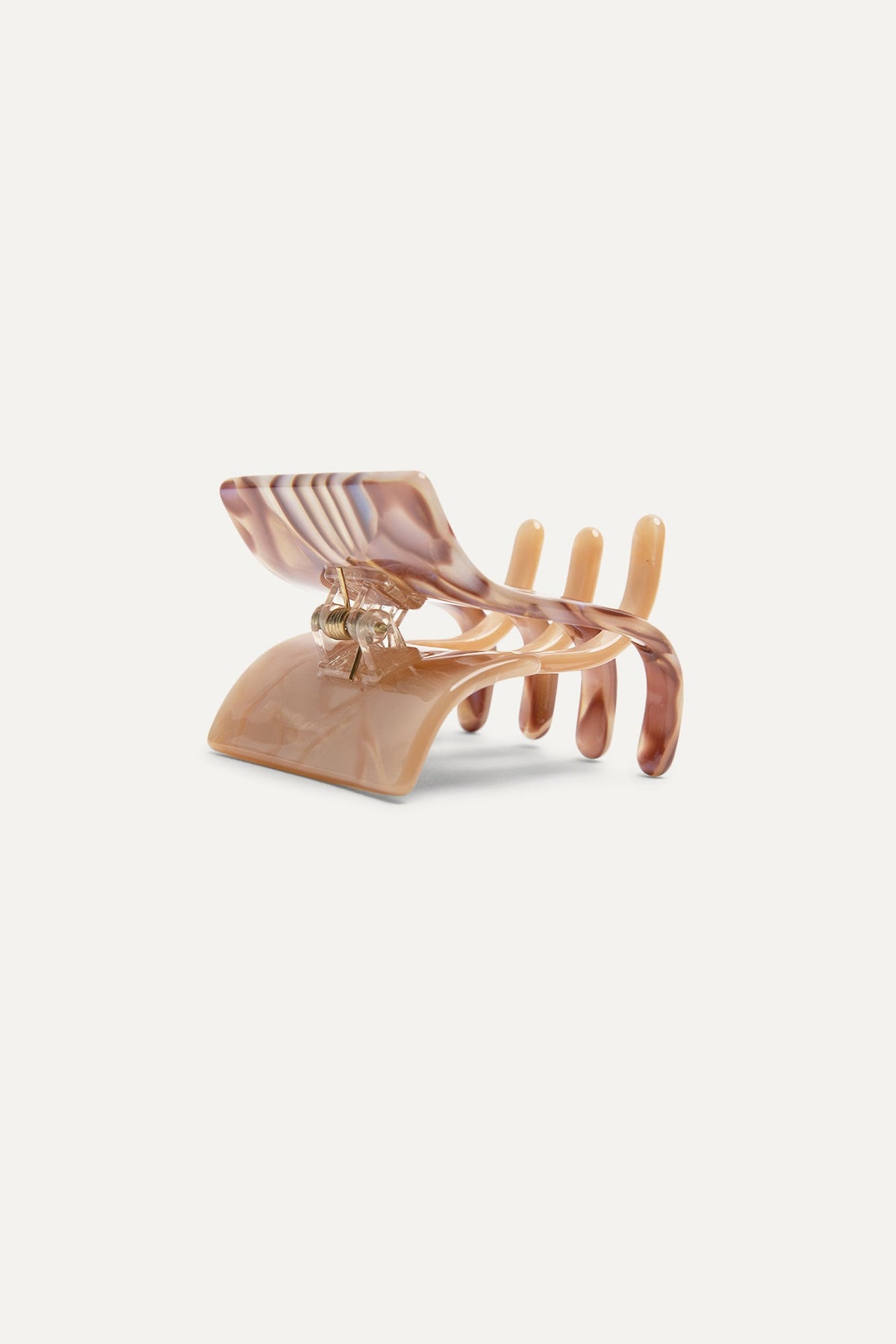 Mini translucent light pink hair claw clip with gold prongs