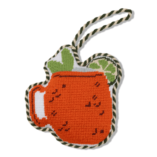 Needlepoint icon ornament shaped like an orange Moscow Mule mug with green trim