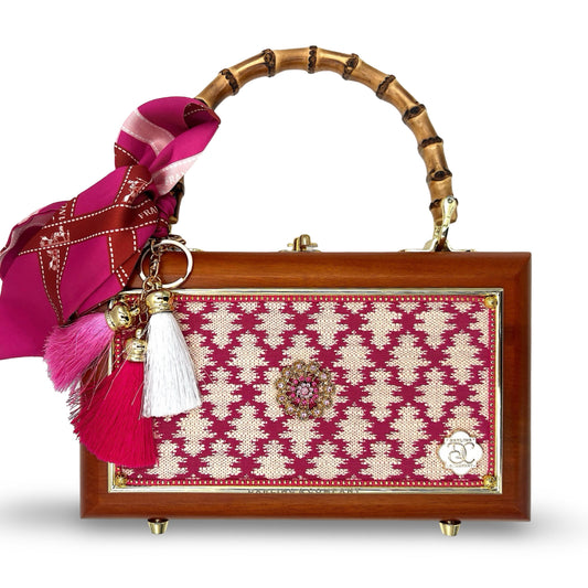 Wooden handbag with bamboo handle and magenta tassel, embroidered magenta front panel