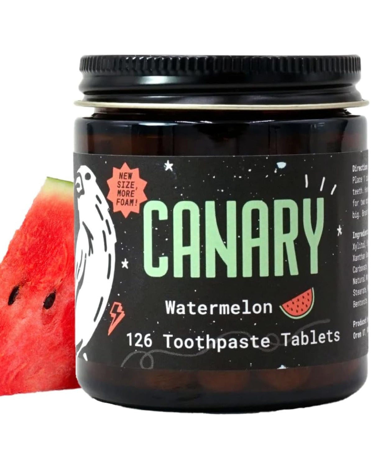 Canary Watermelon toothpaste tablets in a dark jar with a black lid