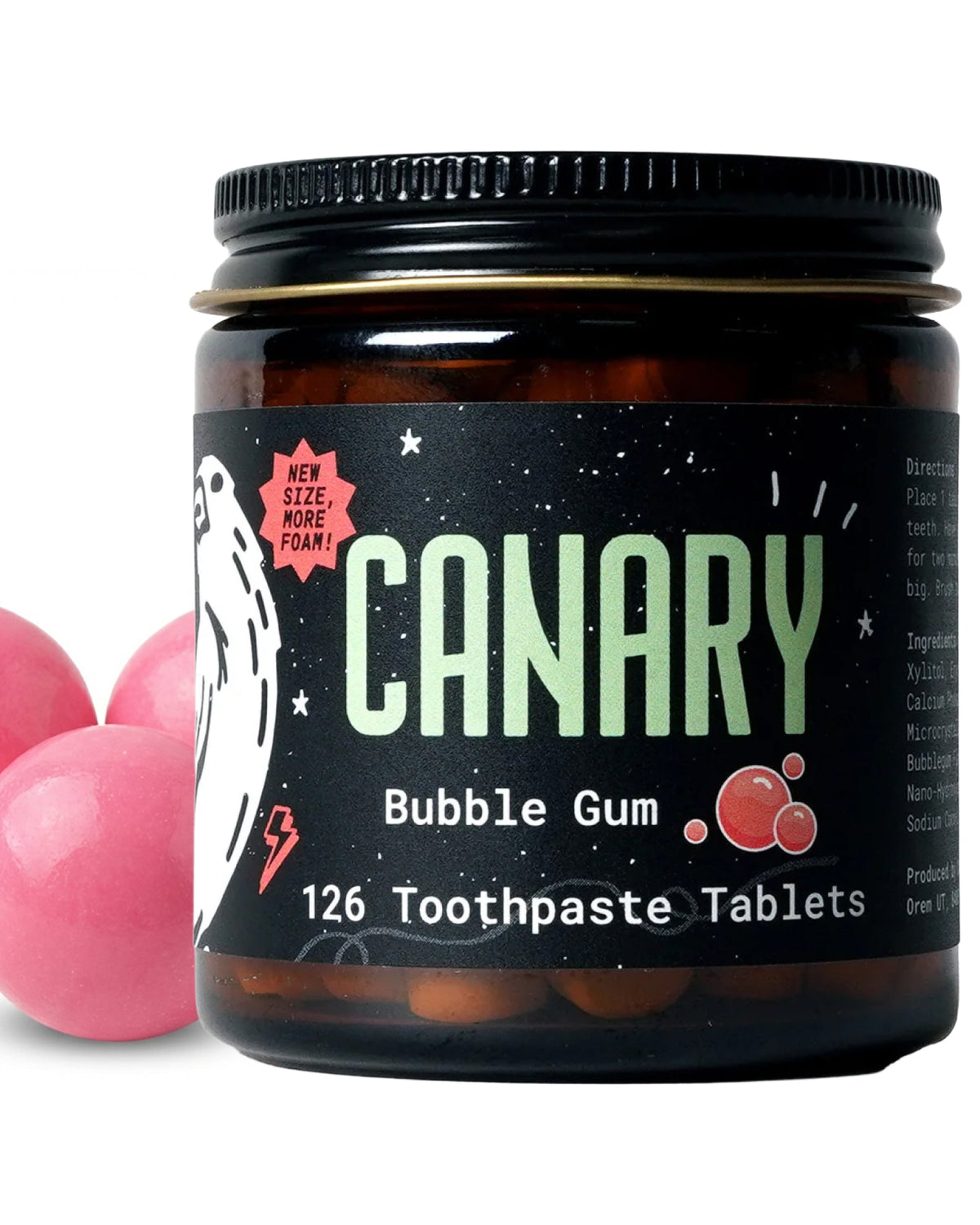 CANARY bubble gum toothpaste tablets in an amber jar with black lid