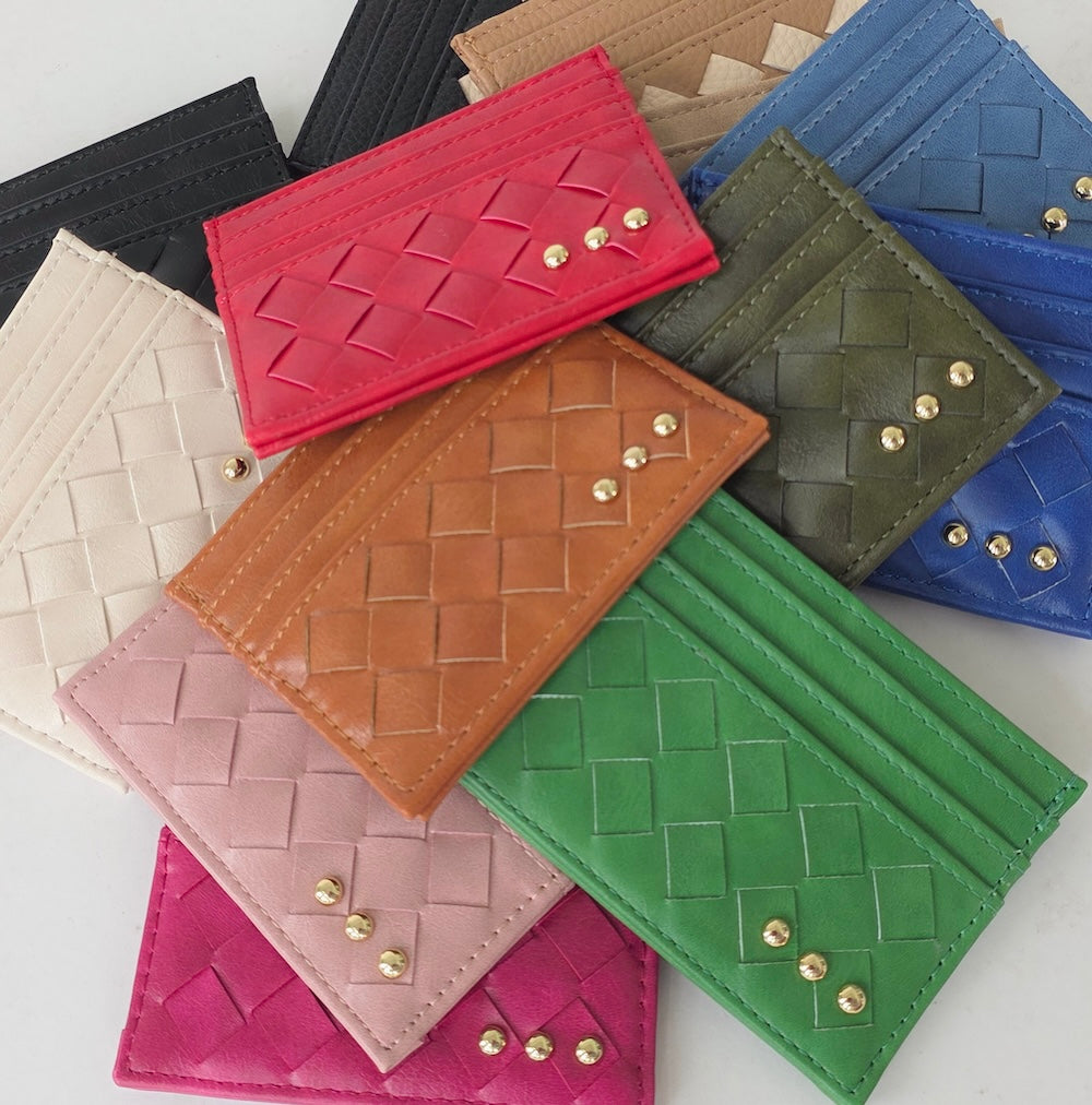 Woven small card holder wallets in multiple colors with gold snap studs.