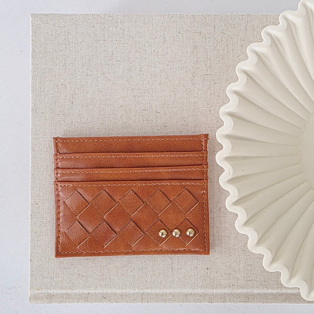 Small woven card holder wallet, rust brown with diamond pattern and 3 gold snap studs