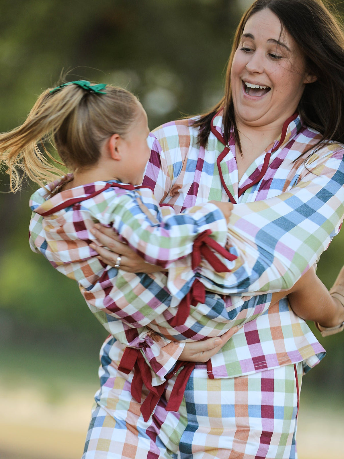 Matching plaid pajama set with long-sleeve tops and shorts with ribbon bows