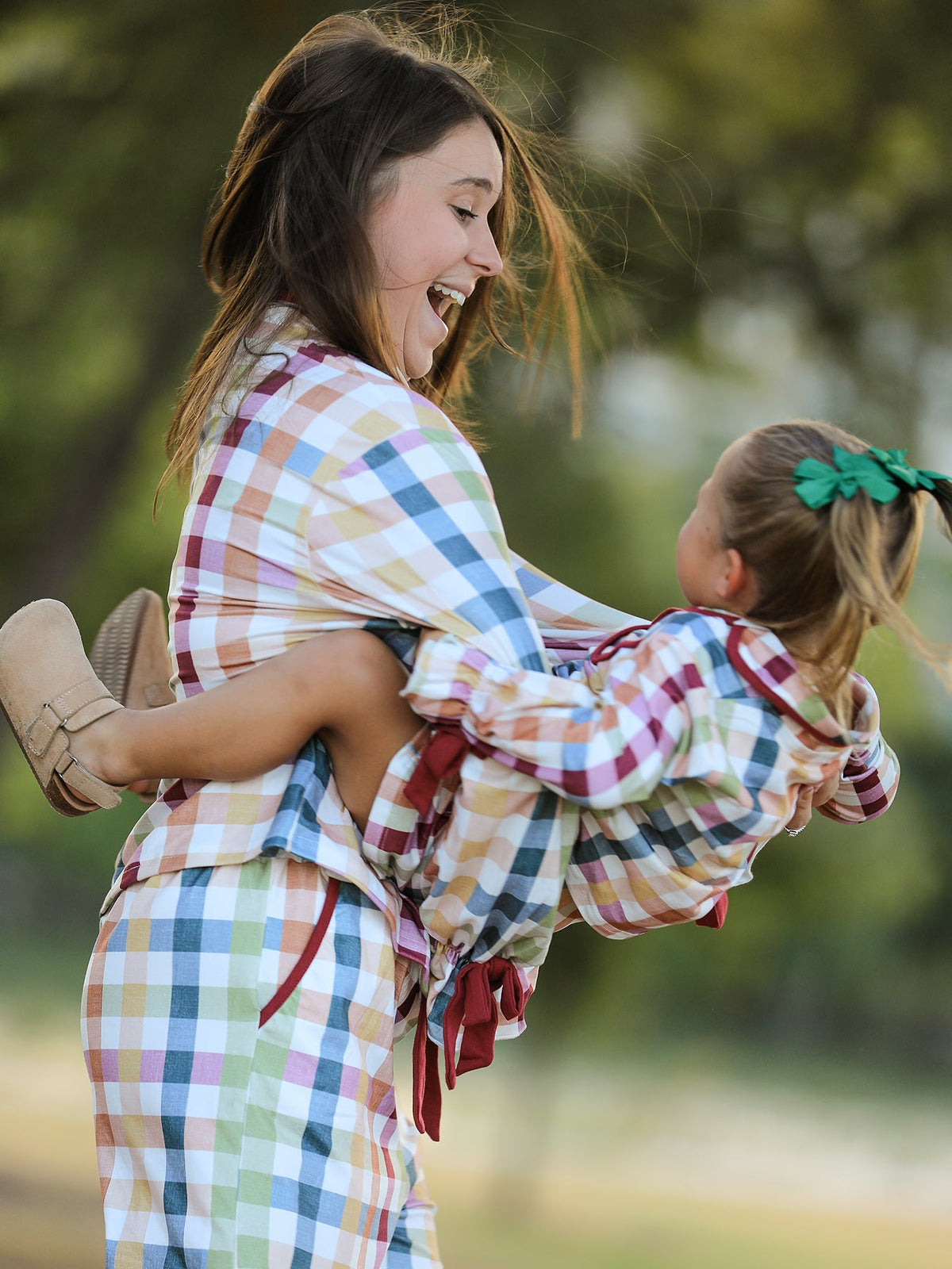 Plaid pajama set for mom and child in long-sleeve button tops and ruffled tie hems