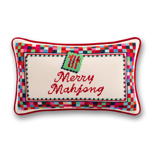 Needlepoint decorative pillow with red plaid border and "Merry Mahjong" text
