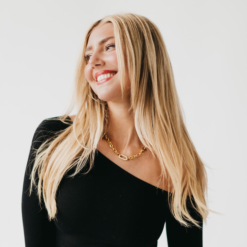 Michaela diamond chain necklace in gold worn by a woman