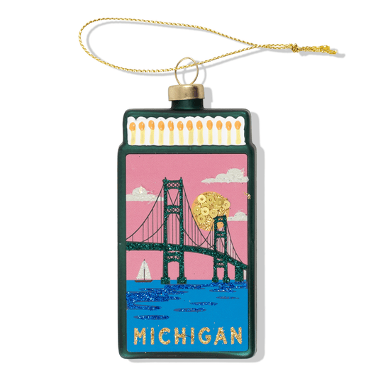 Michigan matchbook ornament with green frame, bridge and heart design, hanging on gold cord