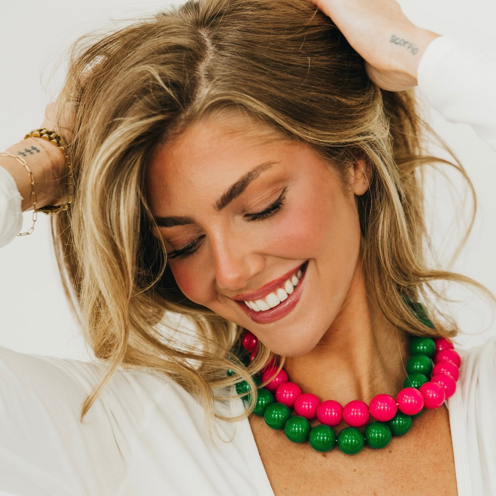 Mindi multipurpose bag charm necklace with green and hot pink round beads