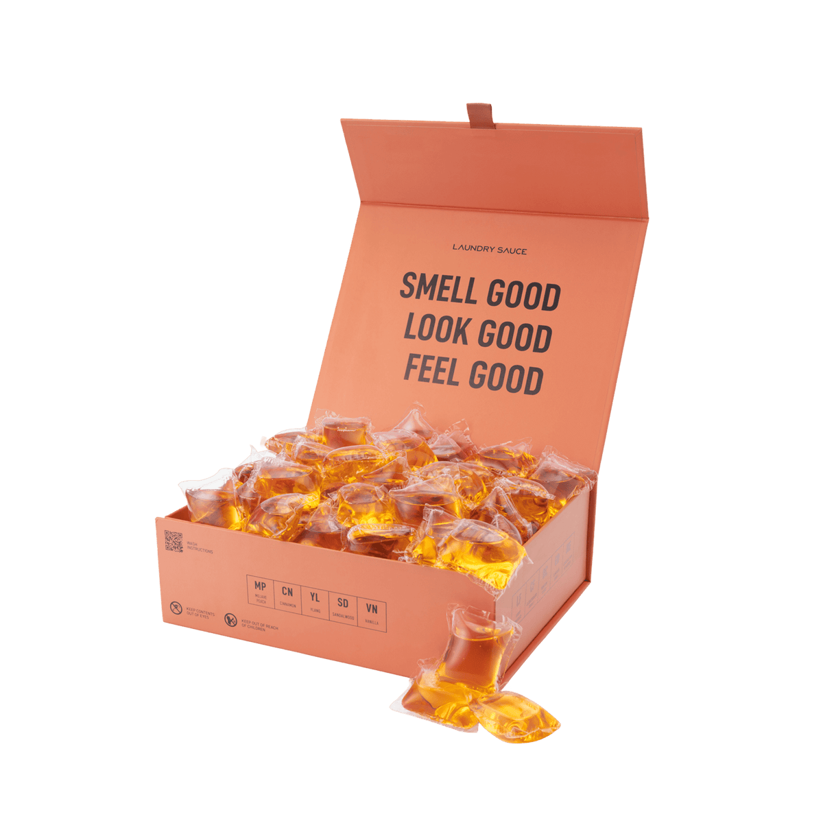 Orange display box of scented laundry detergent pods with amber gel pods