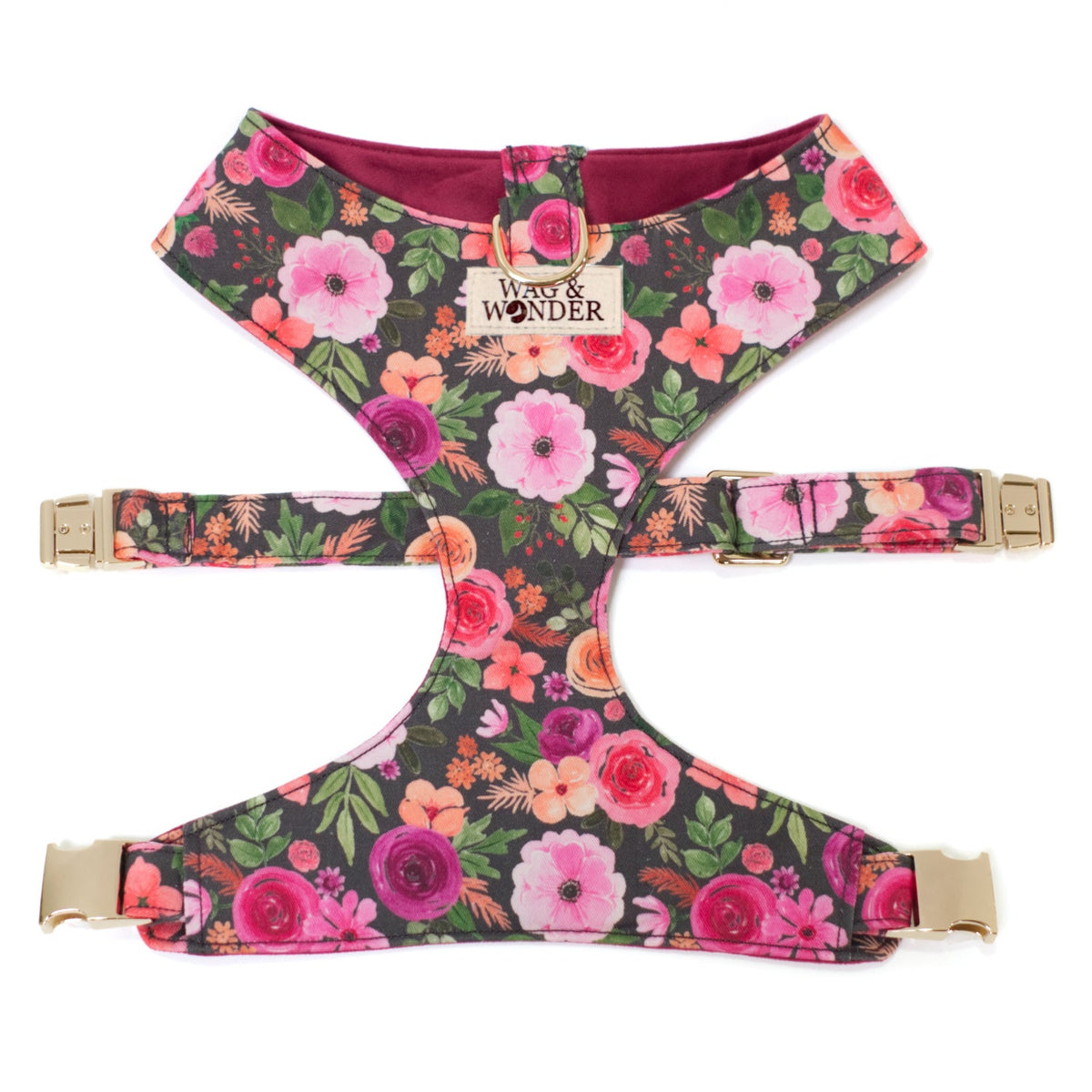 Reversible dog harness with floral print body and burgundy trim, adjustable straps