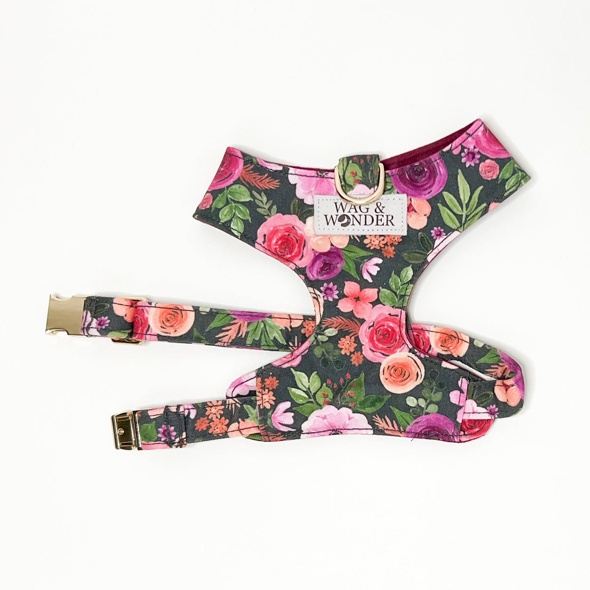 Reversible dog harness with floral print and burgundy reverse side, gold hardware