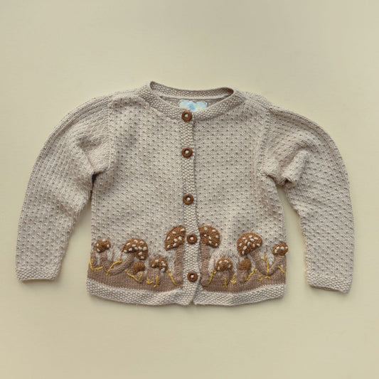 Light oatmeal knit cardigan with mushroom embroidery and brown button-front, long sleeves