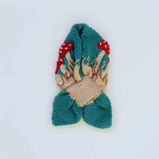 Knit mushroom neck scarf with teal green base, cream stems, red caps