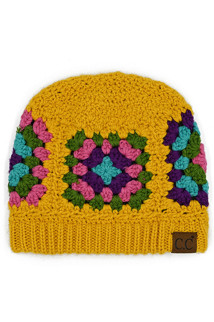 C.C crochet beanie with mustard body and multicolor floral pattern
