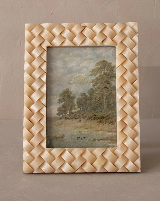 Ivory woven resin picture frame holding a 5x7 landscape print in a woven border