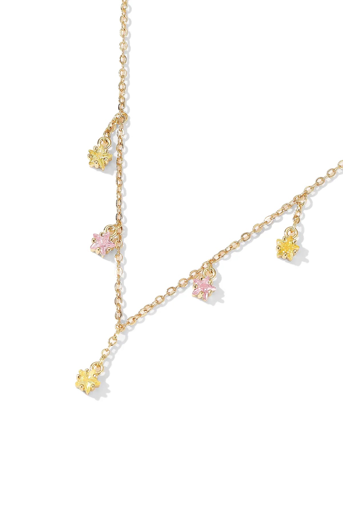 Gold pendant necklace with five small pink and yellow flower charms.
