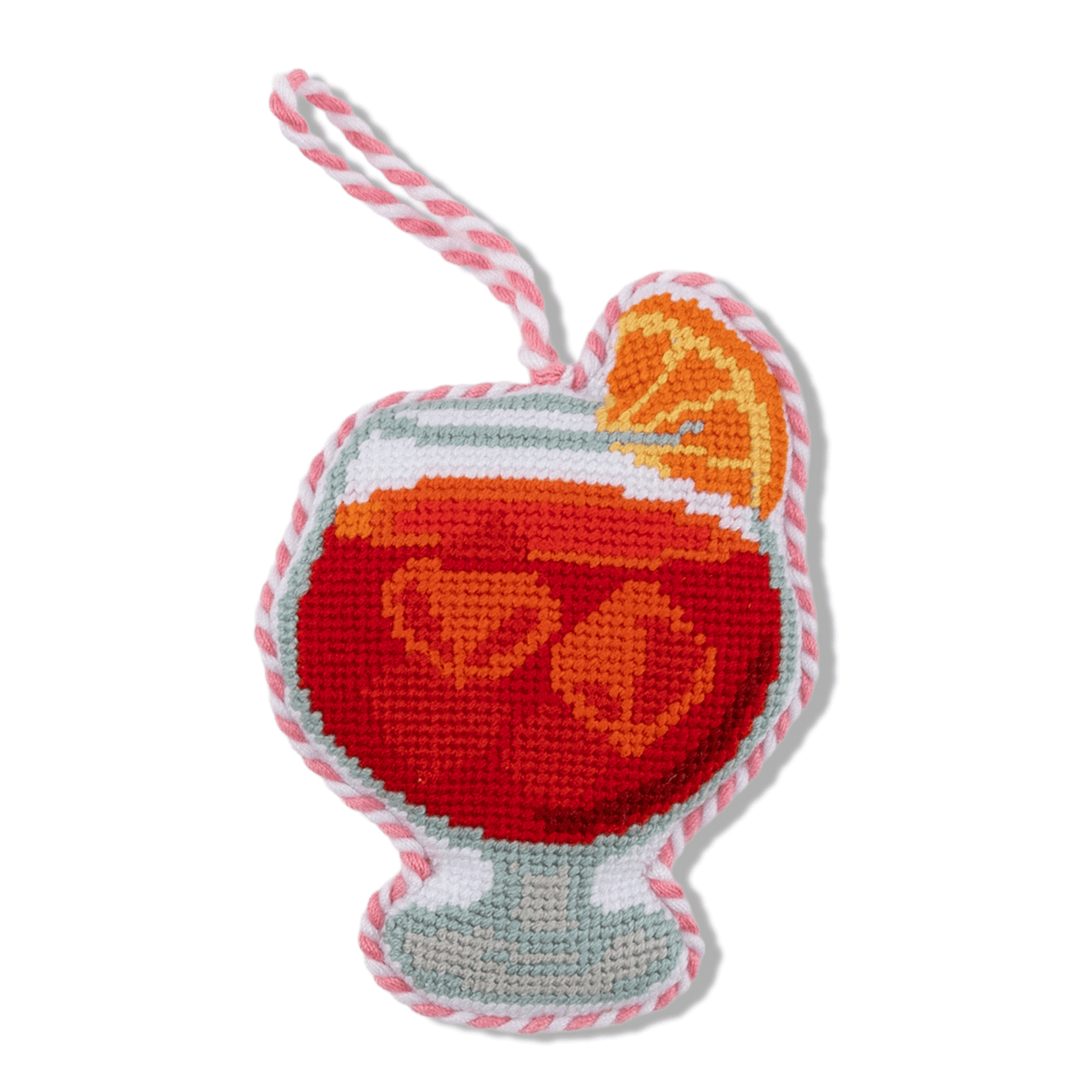 Needlepoint cocktail icon ornament in red and orange with hanging ribbon loop