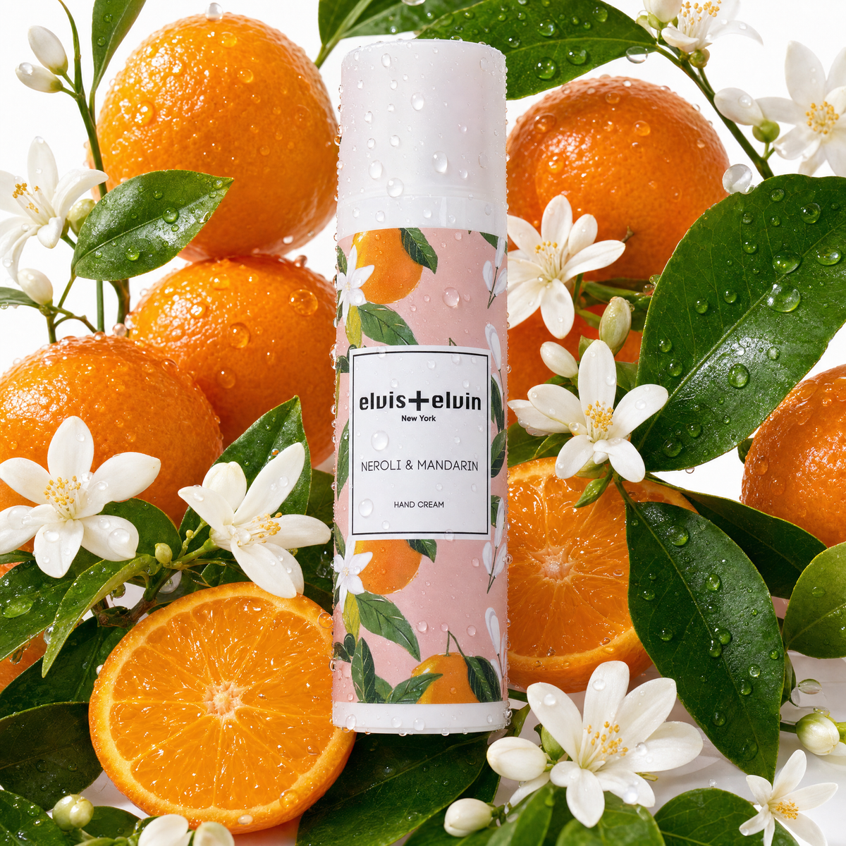 Hand cream bottle with floral citrus label and white cap, elvis+elvin Neroli & Mandarin