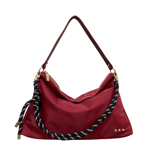 Nylon slouchy shoulder bag in burgundy with rope shoulder strap and gold hardware