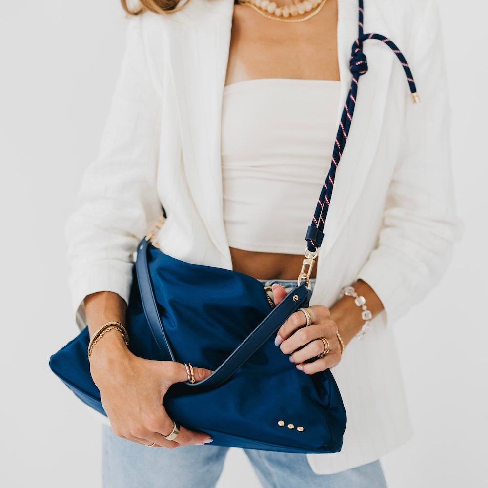 Nylon slouchy shoulder bag in navy blue with rope strap and gold hardware