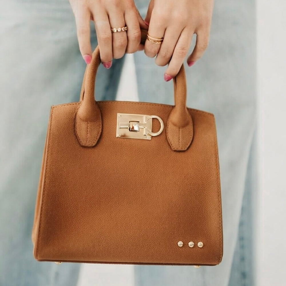 Camel suede small tote bag with gold buckle clasp and stud details