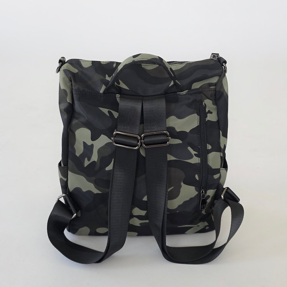 Camouflage nylon purse backpack with adjustable dual buckled straps and side handle