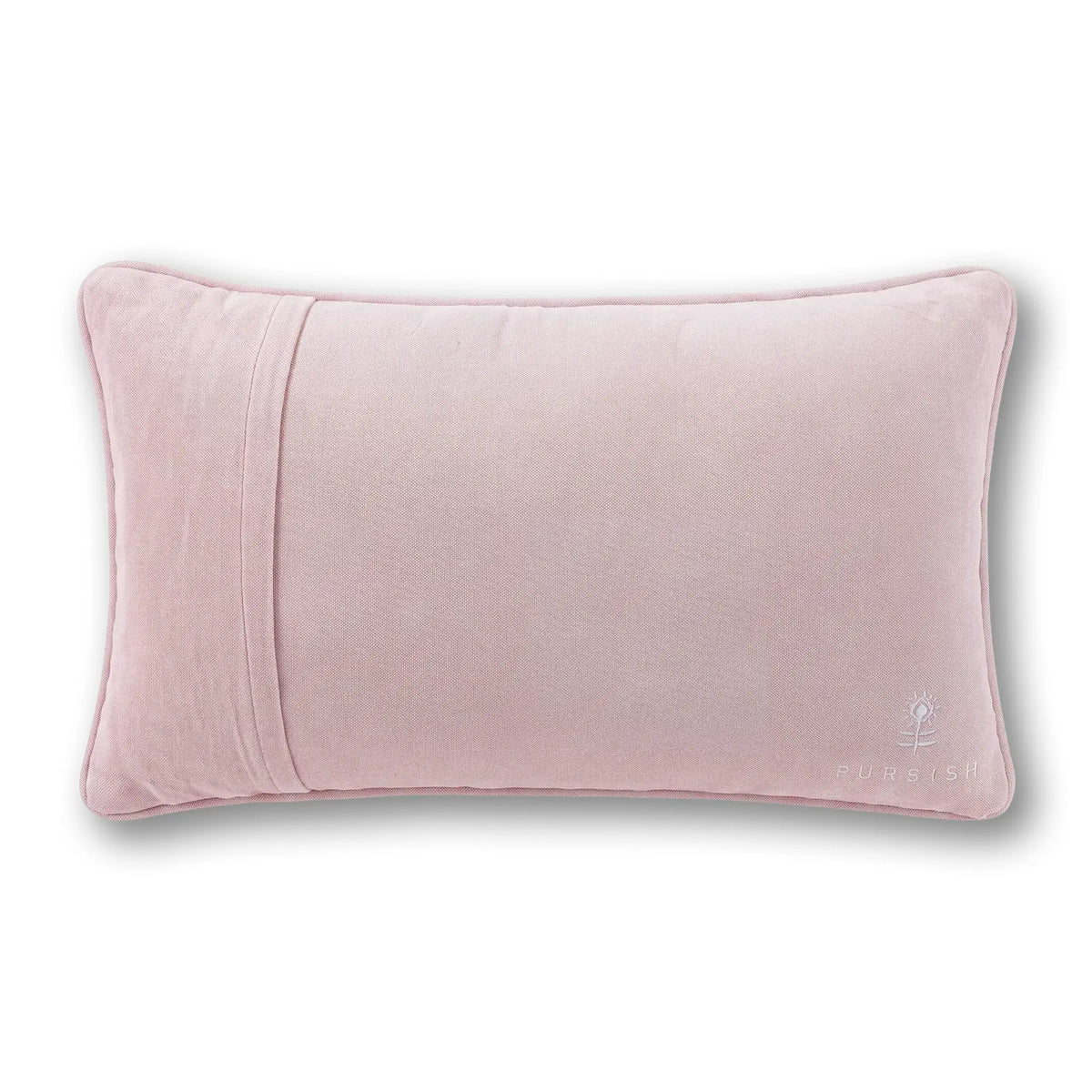 Light pink rectangular pillow with subtle seams and small embroidered emblem
