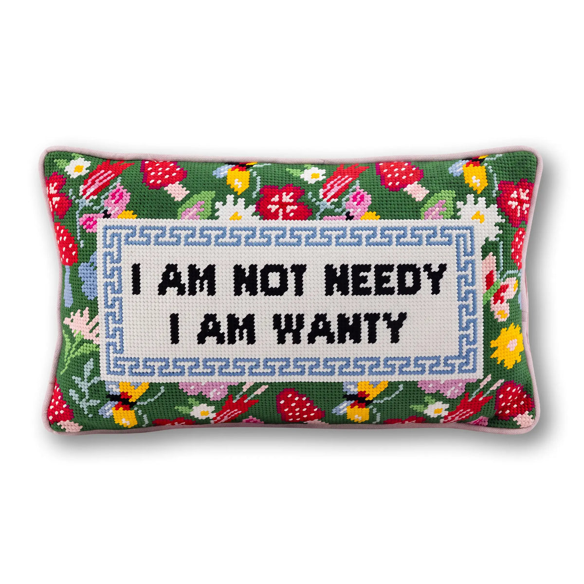 Rectangular needlepoint pillow with red/green floral border and "I AM NOT NEEDY" text