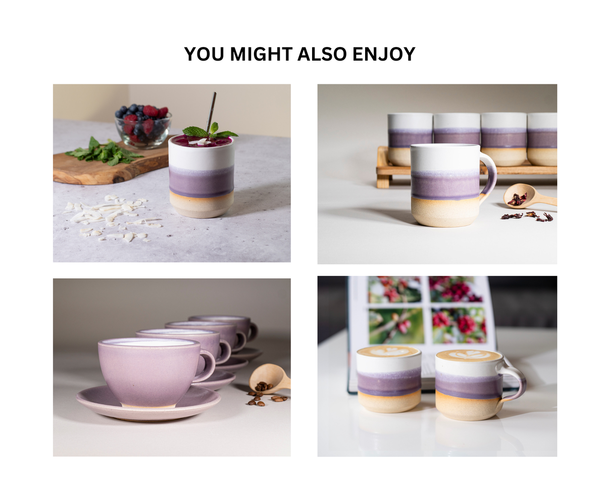Purple stoneware soup bowls on a table, set of matching mugs