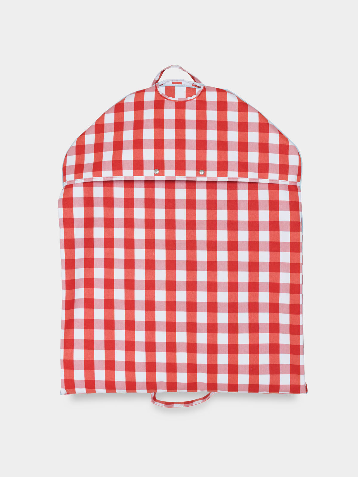 Red and white gingham garment bag showing a horizontal flap and handle