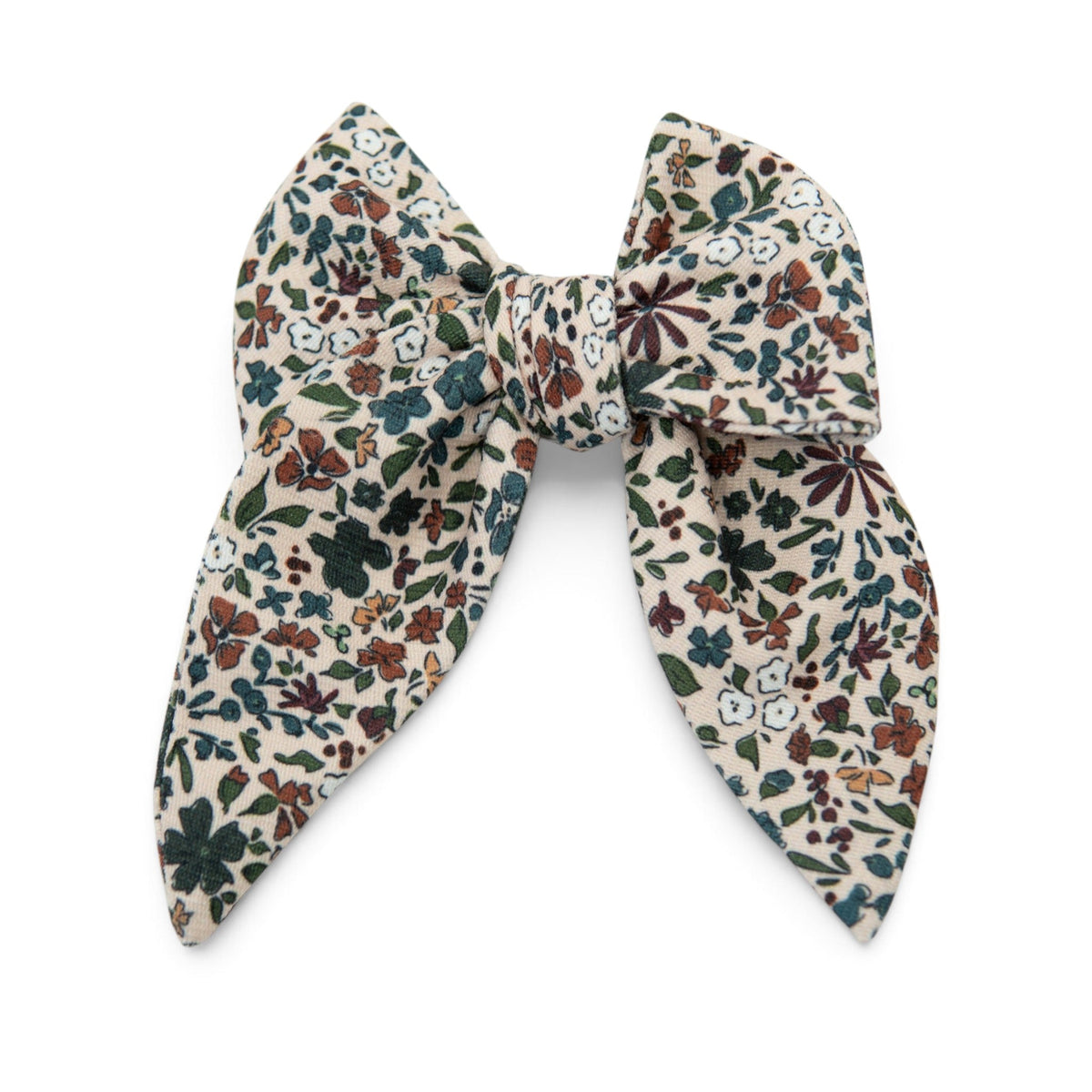 Floral hair bow with cream base and multicolor leaf-and-flower print