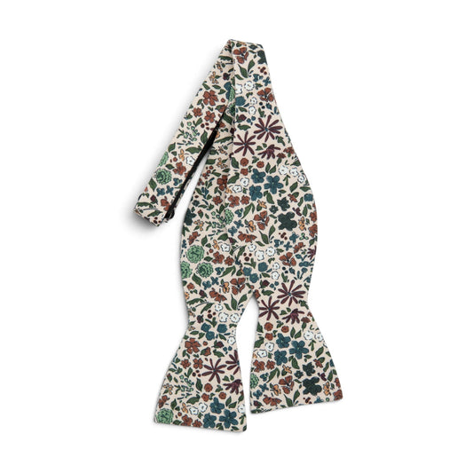 Floral self-tie bow tie with cream base and multicolor orchard print