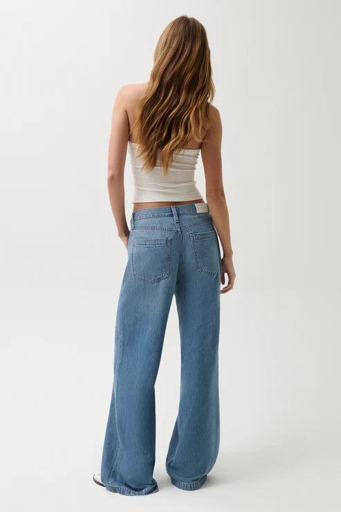 Women's light-blue mid-rise drawstring palazzo jeans, back view with wide legs