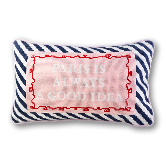 Needlepoint pillow with navy zigzag border and pink Paris quote embroidery