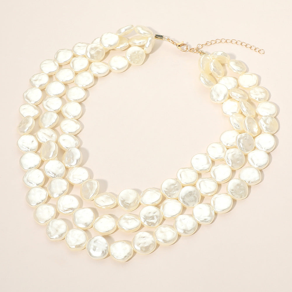 Triple-layer disc pearl beaded statement necklace with gold-tone chain and oval pearl discs