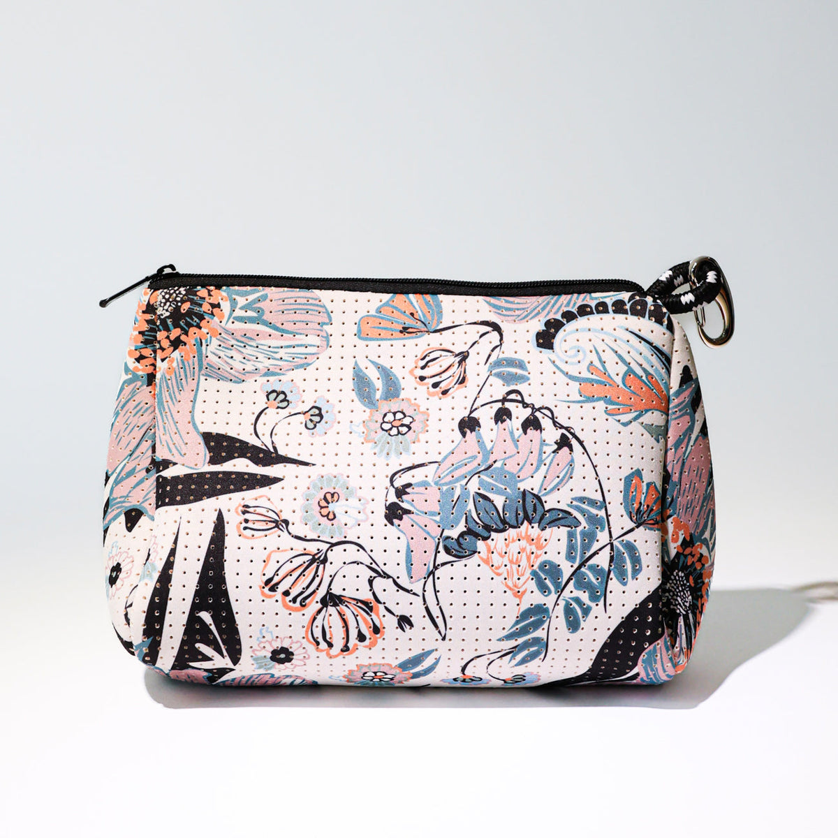 Pastel blossom-pattern zip-top canvas pouch with black zipper and trim
