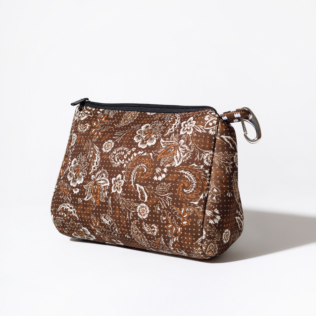 Zip pouch in cocoa paisley print with black zipper and metal ring pull